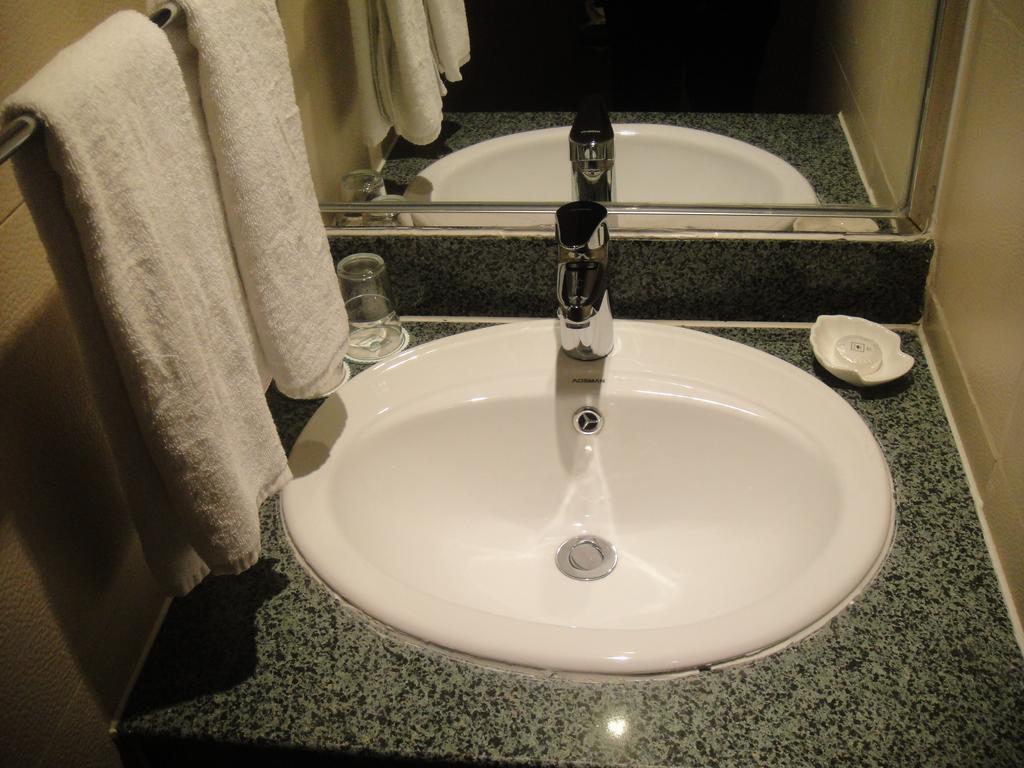 New Gloria Plaza Garden Hotel Harbin Habitación foto