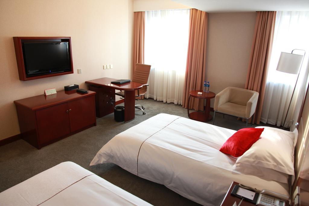 New Gloria Plaza Garden Hotel Harbin Habitación foto