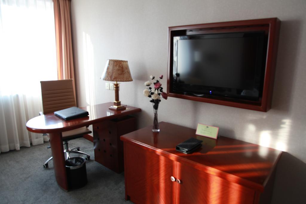 New Gloria Plaza Garden Hotel Harbin Habitación foto