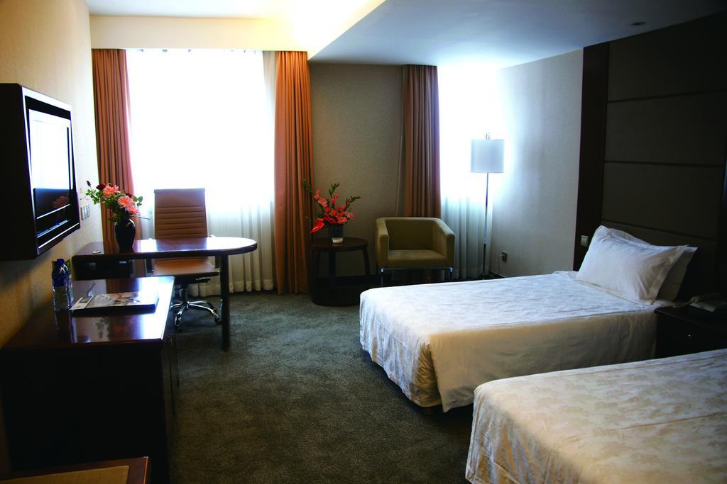 New Gloria Plaza Garden Hotel Harbin Habitación foto