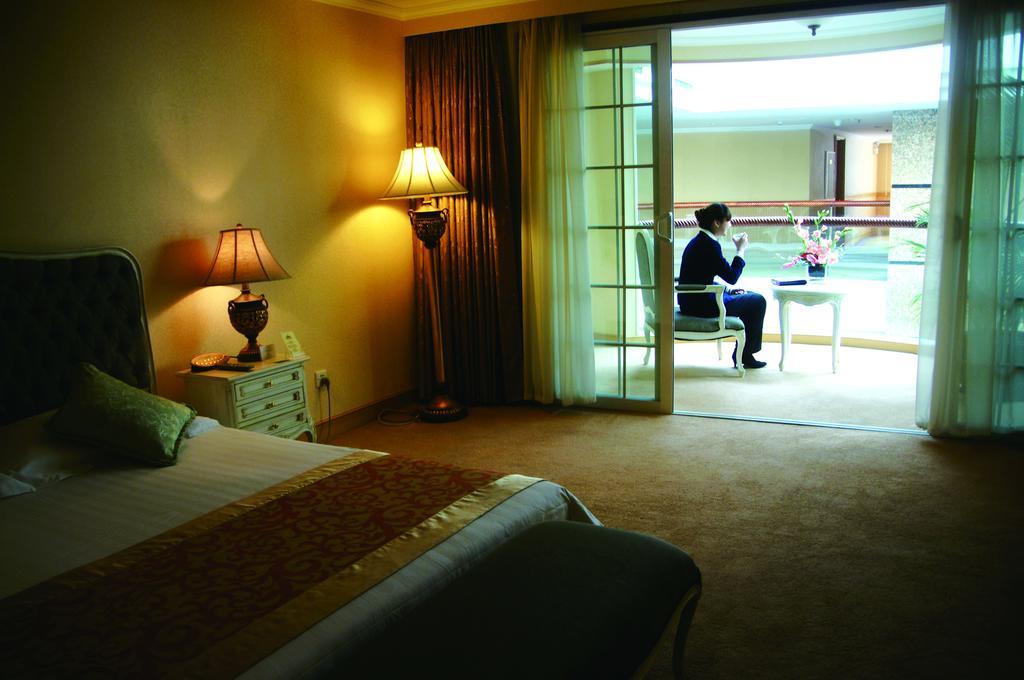 New Gloria Plaza Garden Hotel Harbin Habitación foto