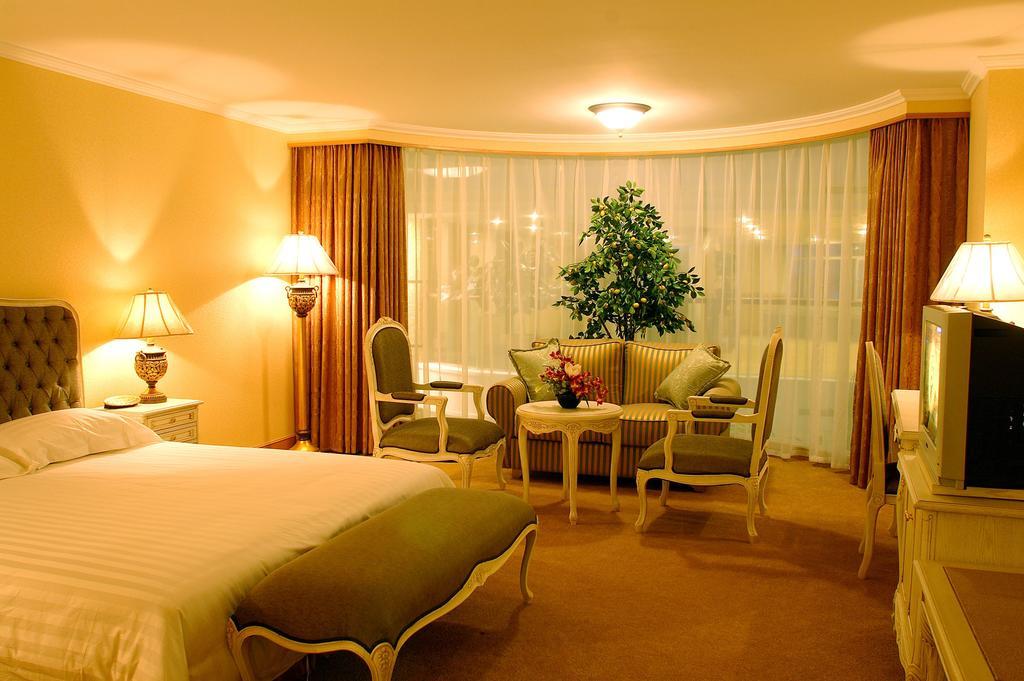 New Gloria Plaza Garden Hotel Harbin Habitación foto