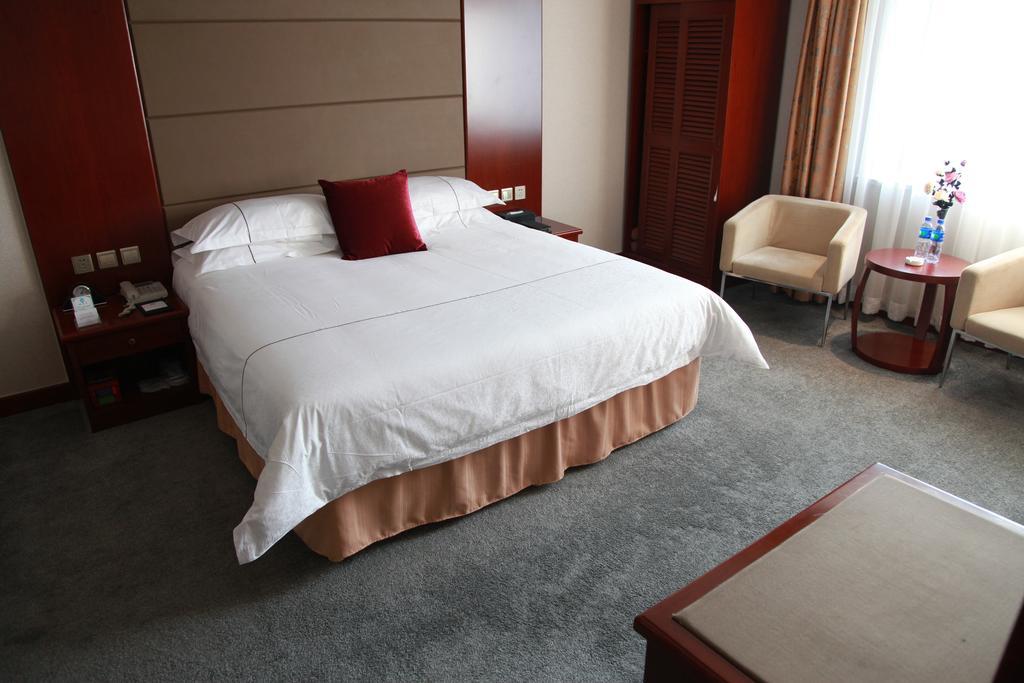New Gloria Plaza Garden Hotel Harbin Habitación foto
